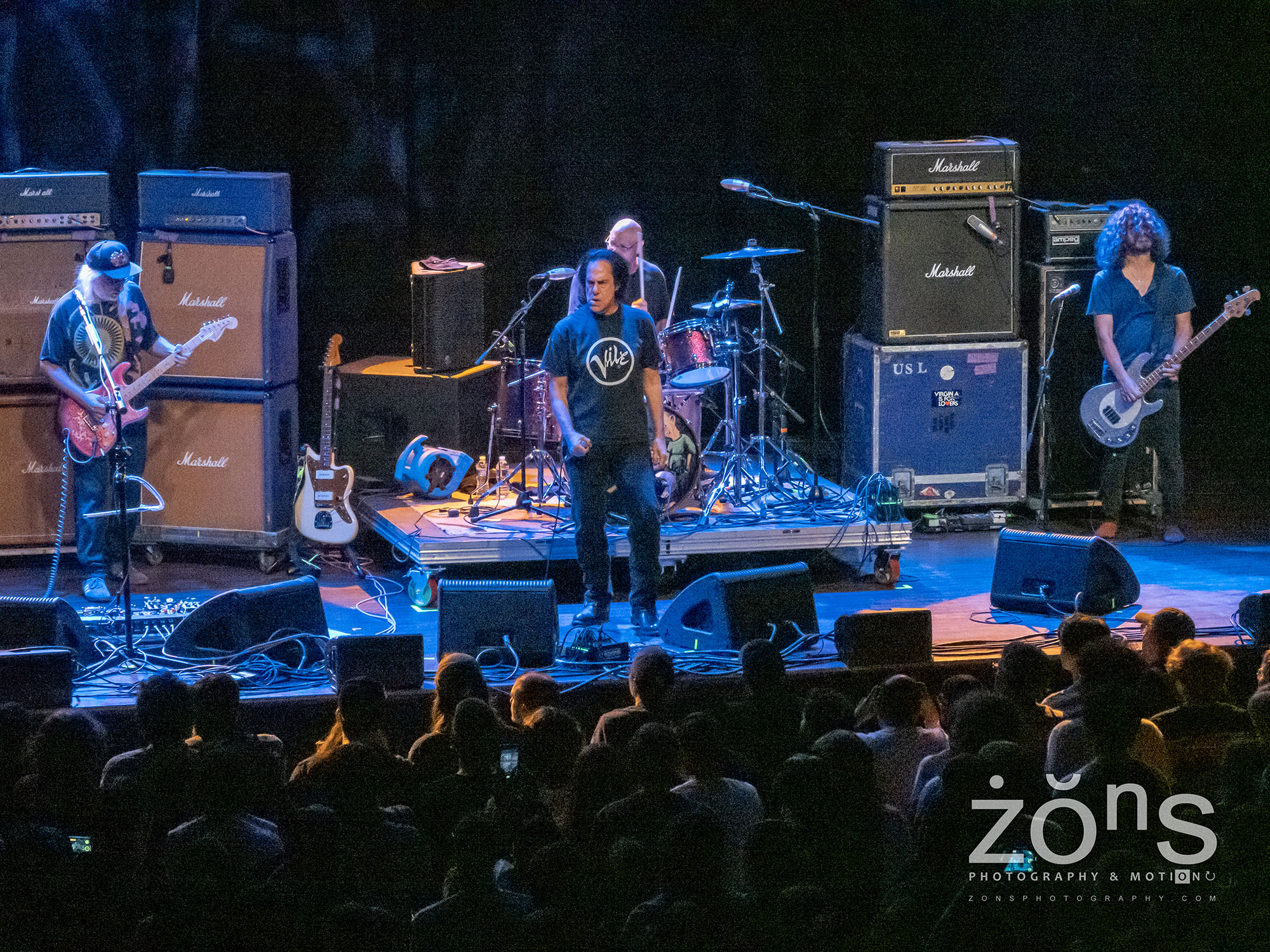 Dinosaur Jr. performing on tour